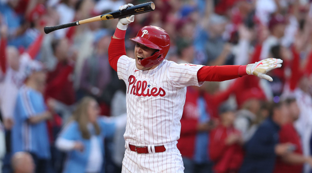 Phillies first baseman Rhys Hoskins celebrates after hitting a three-run home run.